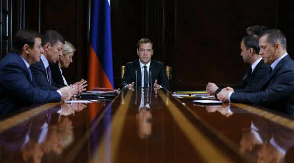 2763223 12/21/2015 December 21, 2015. Russian Prime Minister Dmitry Medvedev, center, chairs a meeting with his deputies at the Gorki residence outside Moscow. From left: Russian Deputy Prime Ministers Alexander Khloponin, Dmitry Kozak and Olga Golodets. From right: Yury Trutnev, Russian Deputy Prime Minister and Plenipotentiary Presidential Representatives in the Far Eastern Federal District, with Russian Deputy Prime Minister Arkady Dvorkovich. Dmitry Astakhov/Sputnik